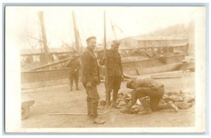 c1918 WWI Greek Army Military Soldier Uniform Digging Boats View RPPC Postcard