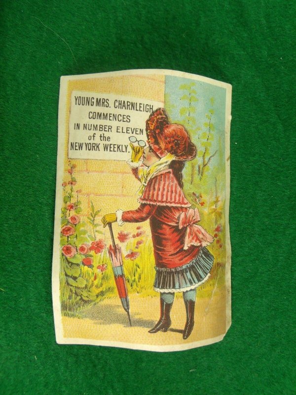 Victorian Trade Card Young Mrs. Charnleigh Commences NY Weekly Girl Fancy Dress