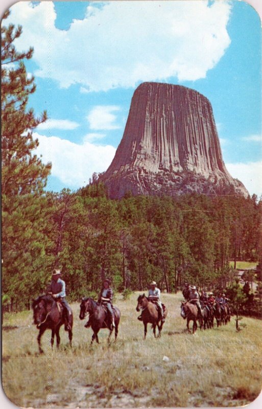 Postcard WY Devils Tower with riders on horseback