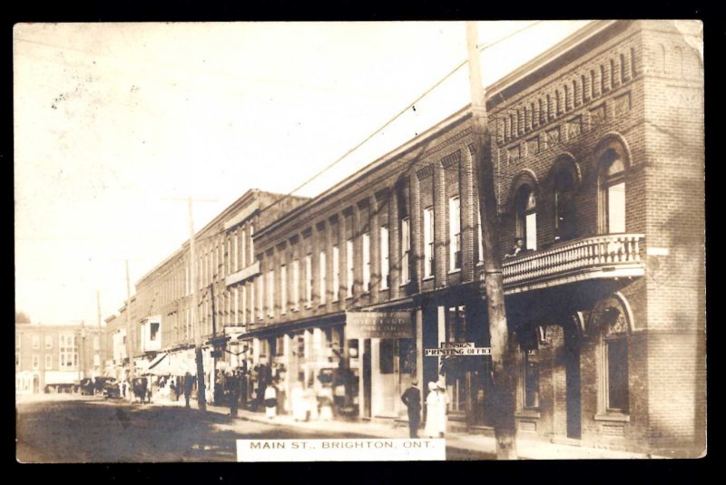 Canada Ontario BRIGHTON Main Street with Store Fronts pm 2c War Tax Stamp RPPC