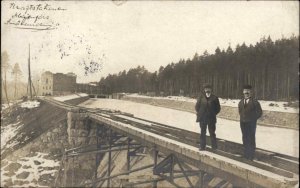 Lund Sweden Cancel Man on RR Train Trestle - Building Real Photo Postcard