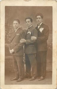 Vintage portrait of three elegant young men photo postcard