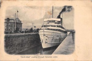 North West Steamer going through Canadian Locks Vintage Postcard AA13798