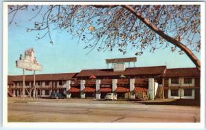 ELKO, Nevada NV  Roadside RANCHINN MOTEL  Highway 40  Woody Wagon 1950s Postcard