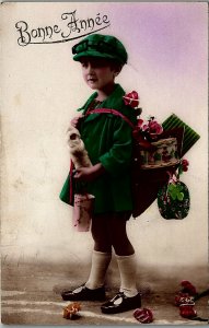 c1920 YOUNG BOY BONNE ANNEE NEW YEAR CARD TINTED REAL PHOTO POSTCARD 17-34 