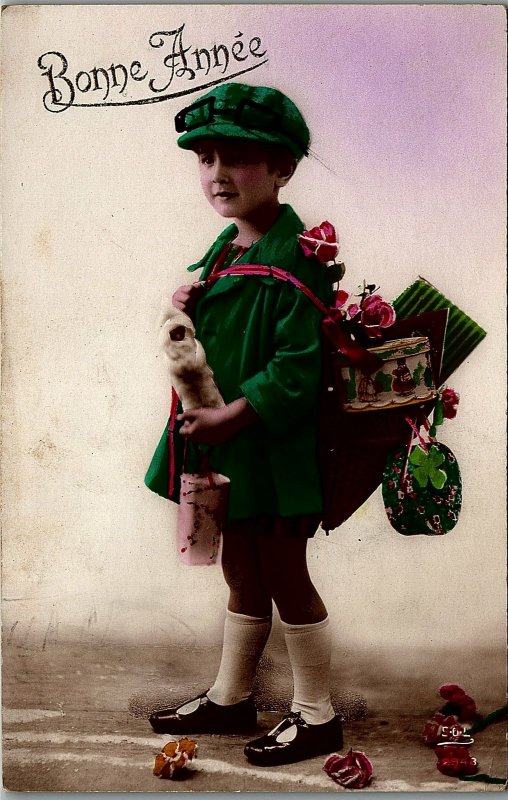 c1920 YOUNG BOY BONNE ANNEE NEW YEAR CARD TINTED REAL PHOTO POSTCARD 17-34 