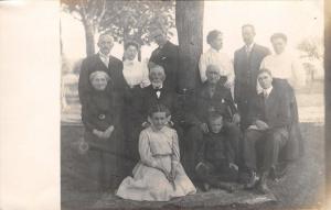 MULTI GENERATION FAMILY IN PERIOD ATTIRE~POSING FOR REAL PHOTO POSTCARD 1910s