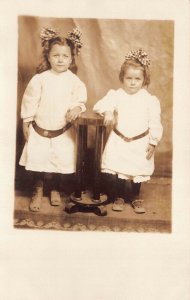 RP Postcard Two Little Girls Matching Dresses and Hair Bows Photo Studio~127892