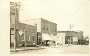 Postcard RPPC C-1910 Street Scene Wisconsin Ornate clock ice cream soda 23-10966