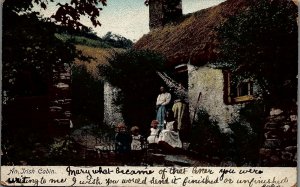 1907 IRELAND AN IRISH CABIN WOMEN CHILDREN EARLY UNDIVIDED POSTCARD 34-303