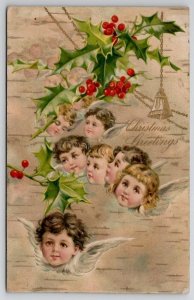 Christmas Greetings Floating Cherub Head Bell Holly Faux Bark Postcard U26