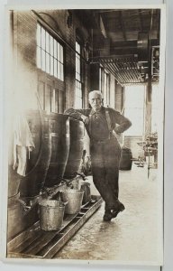 RPPC Occupational Interior View Machine Shop Worker with Barrels Postcard Q13