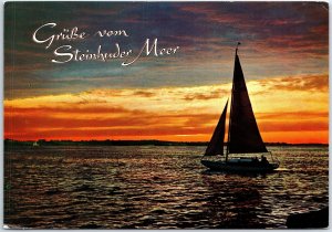 VINTAGE CONTINENTAL SIZED POSTCARD SAILING AT SUNSET ON LAKE STEINHUDER GERMANY