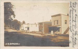 Bangor NY Street View Storefronts in 1907 Real Photo Postcard