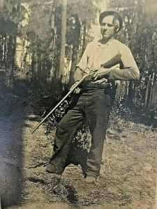 Postcard  RPPC Man Hunting with an Old Rifle and Bullet Belt..    U6