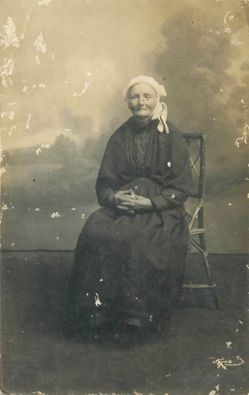 Postcard senior citizen sitting old lady picture