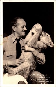 Real Photo PC Mr. Gay Feeding Baby Lion Gay's Lion Farm in El Monte, California