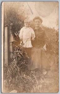 c1910 RPPC Real Photo Postcard Mother And Child Outdoor Field Grass