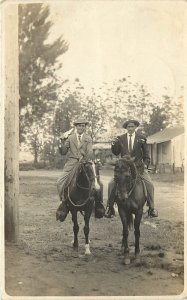 RPPC Postcard 2 Fancy Men on Horses Drinking a Beer