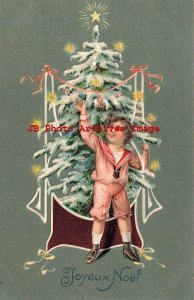 Christmas, Unknown Pub, Boy Decorating a Candle Lit Tree