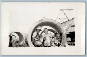 c1910's Children Little Boy In Concrete Tubes RPPC Photo Antique Postcard