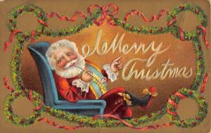 Merry Christmas Santa Sitting And Smoking Holly Wreath Antique Postcard K39402