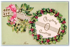 c1905 Christmas Greetings Banjo Holly Berries Embossed Clapsaddle Postcard