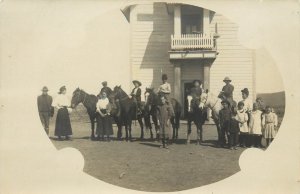 RPPC Postcard Masked Vigentte People On Horseback by School/Church Unknown US