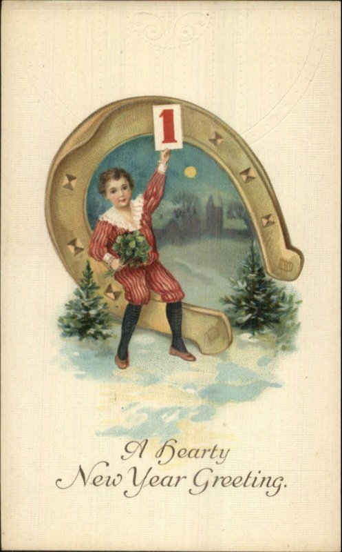 New Year - Little Boy Sitting on Giant Horseshoe c1910 Embossed Postcard