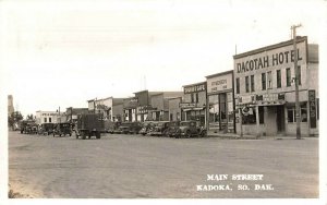 Kadoka SD Main Street Hotel Tourist Cafe Old Cars Trucks RPPC