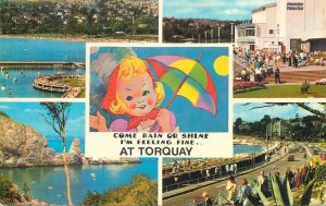 UK England Devon Torquay cartoon girl and umbrella pier