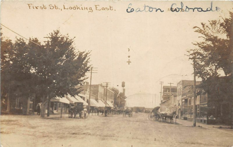 J16/ Eaton Colorado RPPC Postcard c1910 First Street Stores Wagons  72