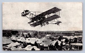 K10/ Syracuse New York Postcard c1910 Fair Tents Biplane Airplane Pilot 162