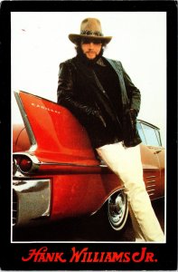 Hank Williams Jr  with Red Five-O Cadillac POSTCARD