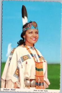 Native American woman in traditional dress postcard