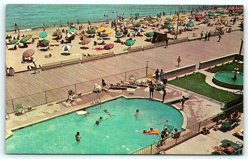 Postcard DE Rehoboth Beach View of Boardwalk Beach and Swimming Pool D10