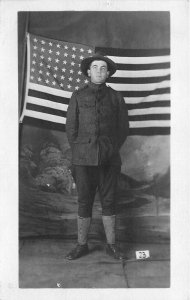 Postcard RPPC C-1918 Patriotic Soldier flag military TP24-2477