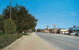 Sonora Texas Street Scene Store Fronts Vintage Postcard K93562