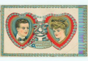 Pre-Linen valentine FACE OF WOMAN AND MAN IN HEARTS TIED BY BLUE RIBBON k5732