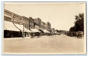 1925 Street View Bakery Restaurant Drugs Store Hutchinson MN RPPC Photo Postcard