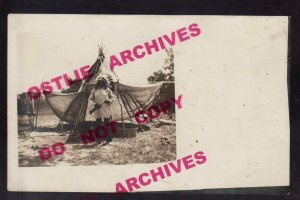 Gordon NEBRASKA RPPC c1910 SIOUX INDIAN CAMP Indians CHIEF & RIFLE Tepee NE