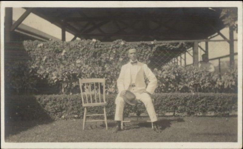 Man in White Suit w/ Hat - Wilton ME Written on Back Real Photo Postcard