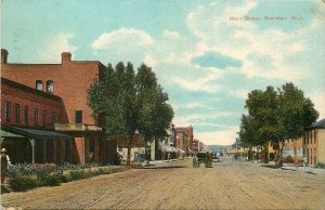 c1910 Postcard Sheridan WY Main Street Scene, Coffeen-Schnitger Trading Co.