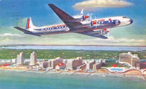 Eastern Airlines Golden Falcon DC7B Plane in Flight 1957 postcard