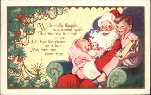 Christmas Little Boy and Baby in Santa's Lap Toy Airplane Vintage Postcard