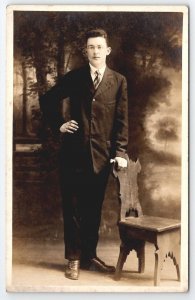 RPPC Young Man With Rustic Chair Studio Forest Backdrop Real Photo Postcard B41