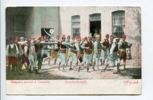 424323 Turkey Constantinople Firefighters running at the fire Vintage postcard