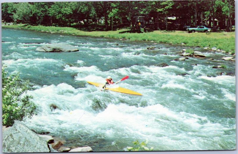 Shooting the rapids in a kayak in Rosendale, New York