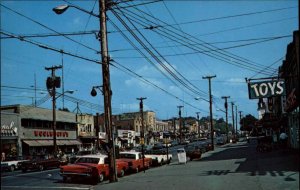 Monticello New York NY Taxi Cabs Toy Store Street Scene Vintage Postcard