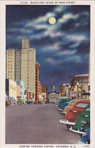 Night Time Scene Of Main Street Looking Towards Capitol